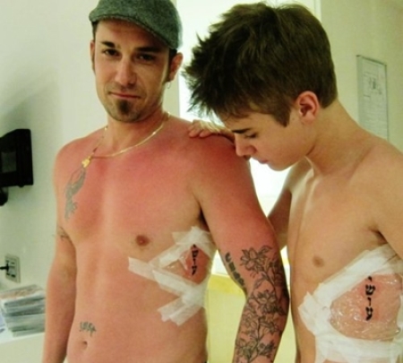 Justin Biebers Tattoos and Meanings  POPSUGAR Beauty