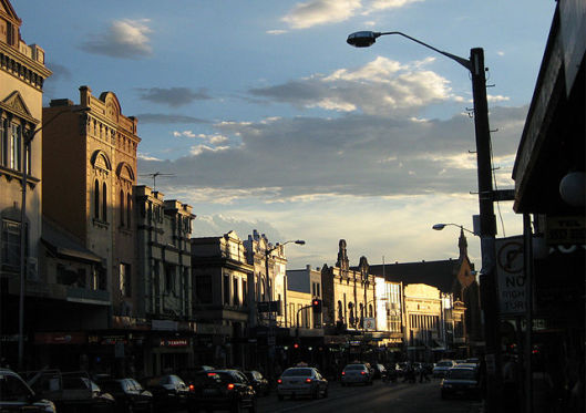 Archbishop Davies helping to build a new Moore College