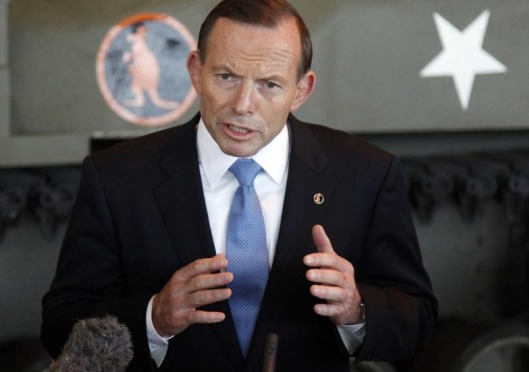 Prime Minister Tony Abbott defends chief advisor against internal criticism