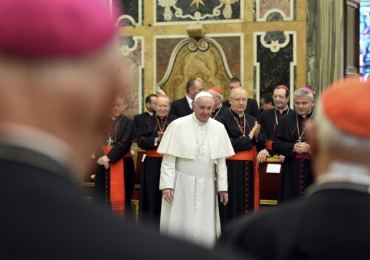 Pope tells Vatican officials reform will go ahead with 'firm resolve'