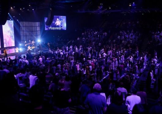 Hillsong ordered to stop singing and dancing at its youth camps